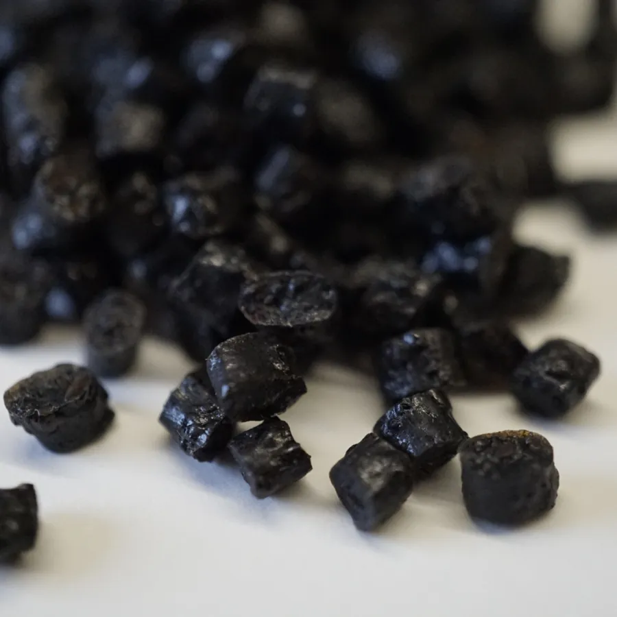 Dark bio-based compound granules